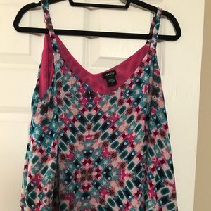 Swing tank top